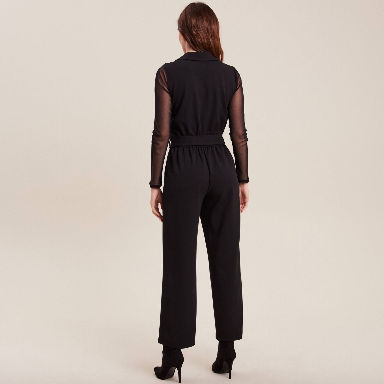 combinaison pantalon resille noir femme de dos